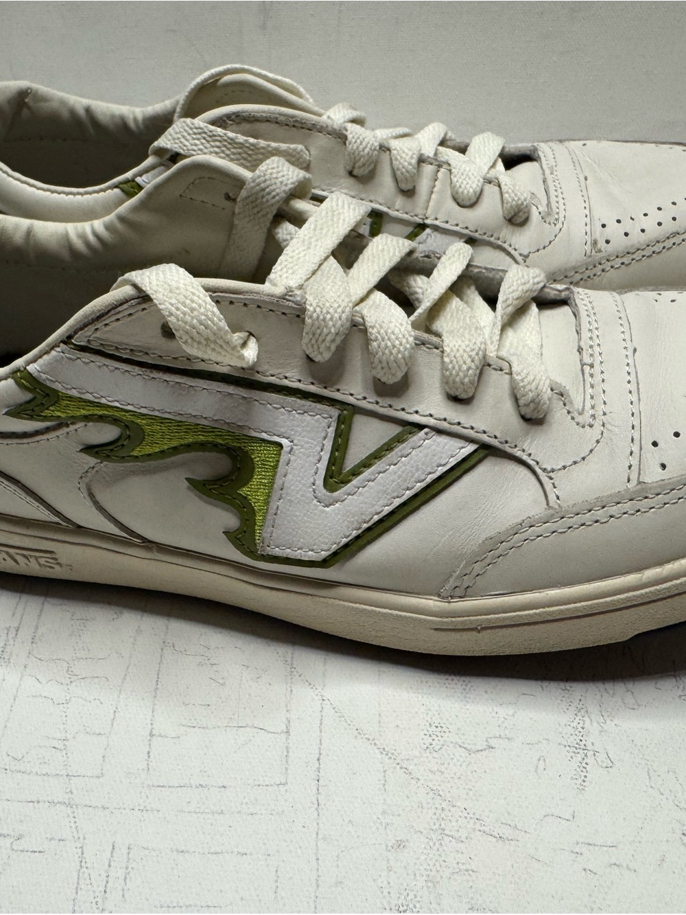Vans White Leather Sneakers with Green Flame Accent